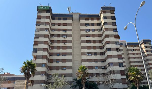 Rehabilitación estructural y estética integral en edificio de 12 plantas portada